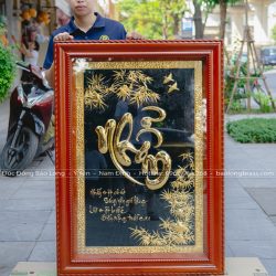 tranh chữ nhẫn thư pháp bằng đồng mạ vàng 24k khung gỗ đỏ khổ 1m27 x 89cm