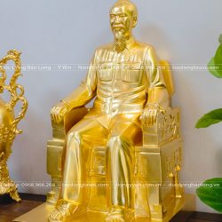 Tượng Bác Hồ ngồi ghế bằng đồng đỏ dát vàng 9999 cao 61cm