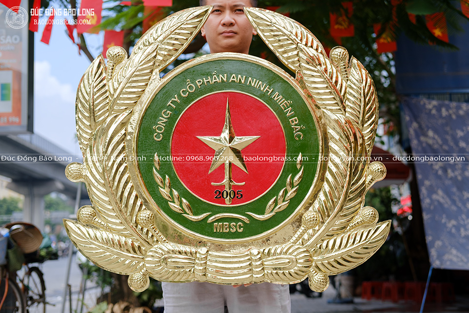 LOGO Công Ty Cổ Phần An Ninh Miền Bắc bằng đồng vàng 90cm